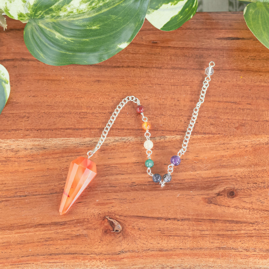 7 Chakra Faceted Carnelian Pendulum