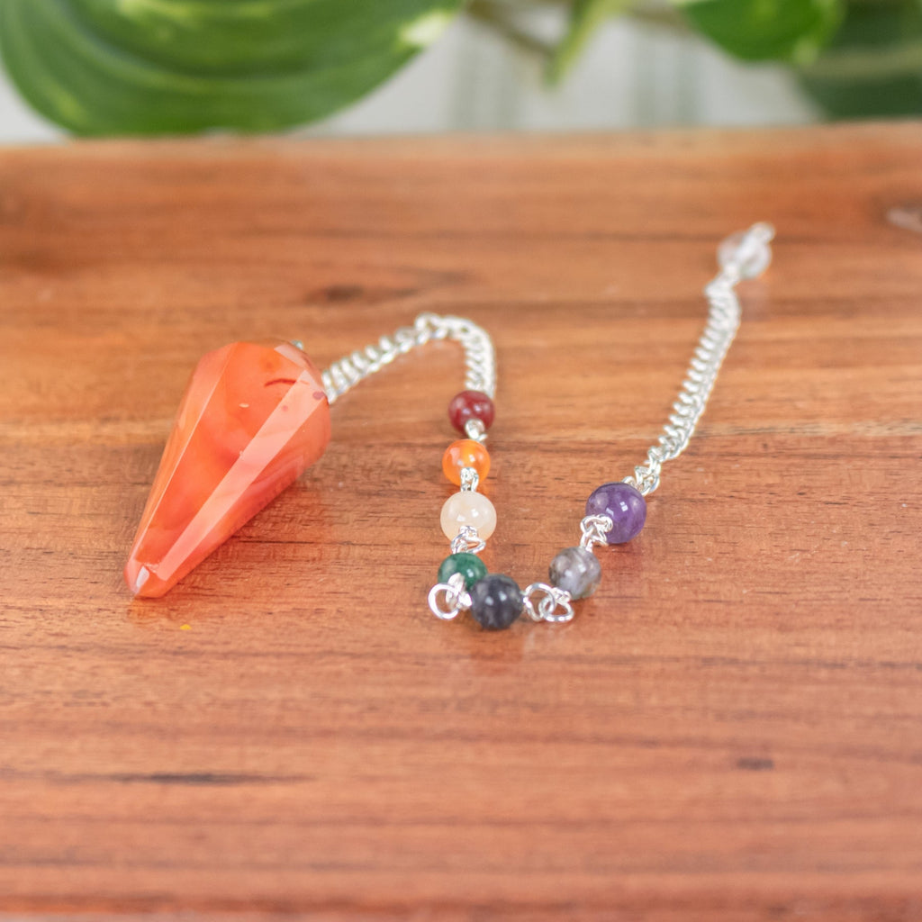 7 Chakra Faceted Carnelian Pendulum